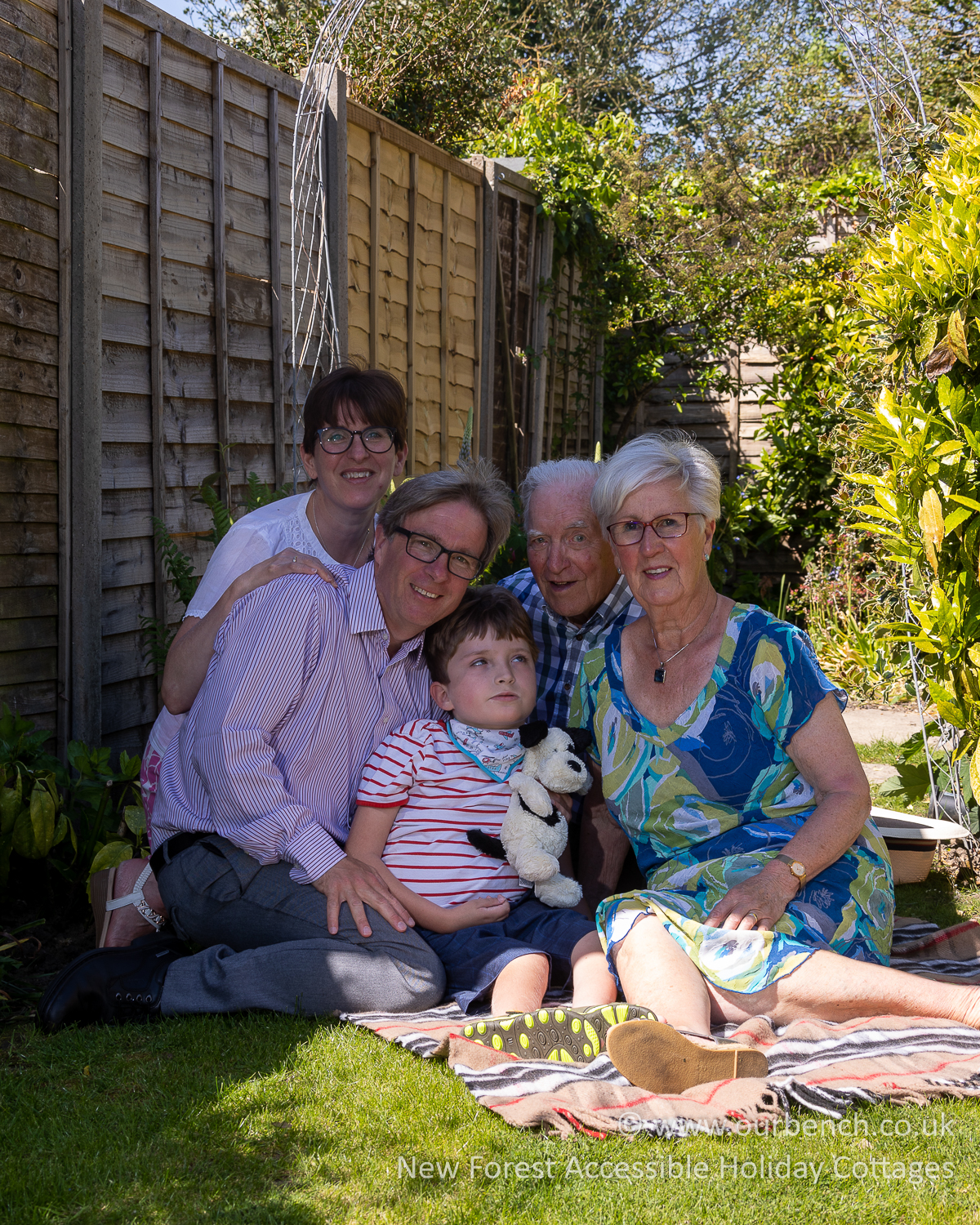 Sam with his family enjoying time together outdoors